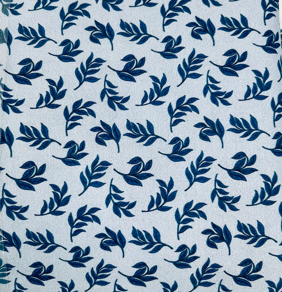 ENDOFBOLT114 Light Blue background with dark blue leaf accents basic 100% cotton quilting fabric
