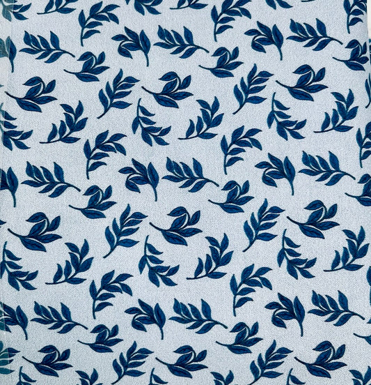 ENDOFBOLT114 Light Blue background with dark blue leaf accents basic 100% cotton quilting fabric